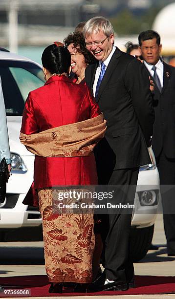 Australian Prime Minister Kevin Rudd shares a joke with Madame Ani Bambang Yudhoyono as she arrives with her husband Dr Susilo Bambang Yudhoyono the...