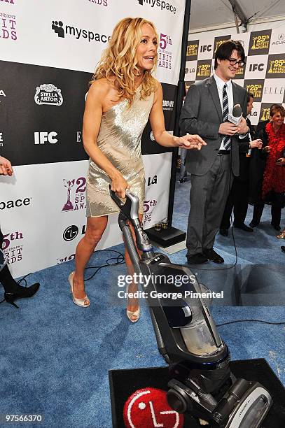 Actress Maria Bello with the LG Electronics Kompressor Vacuum on The 25th Spirit Awards Blue Carpet held at Nokia Theatre L.A. Live on March 5, 2010...