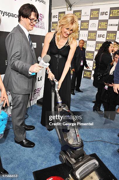 Mark Olsen and actress Laura Dern with the LG Electronics Kompressor Vacuum on The 25th Spirit Awards Blue Carpet held at Nokia Theatre L.A. Live on...