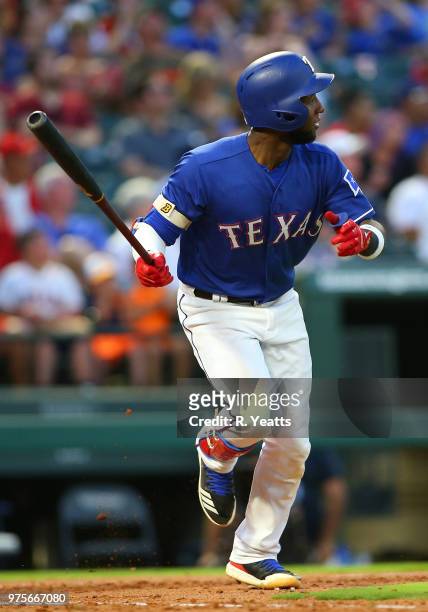 Jurickson Profar of the Texas Rangers hits in the sixth inning against the Houston Astros at Globe Life Park in Arlington on June 9, 2018 in...