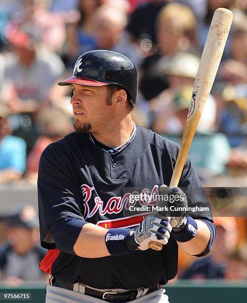 Eric Hinske of the Atlanta Braves bats against the Detroit Tigers during a spring training game at Joker Marchant Stadium on March 8, 2010 in...