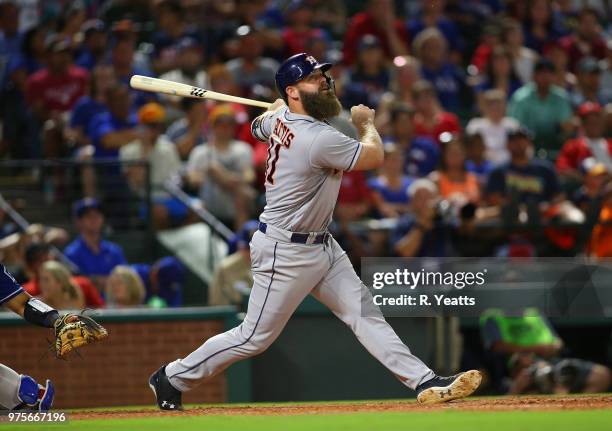 Evan Gattis of the Houston Astros hits in the eight inning against the Texas Rangers at Globe Life Park in Arlington on June 9, 2018 in Arlington,...