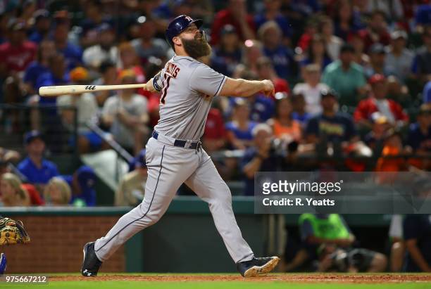 Evan Gattis of the Houston Astros hits in the eight inning against the Texas Rangers at Globe Life Park in Arlington on June 9, 2018 in Arlington,...