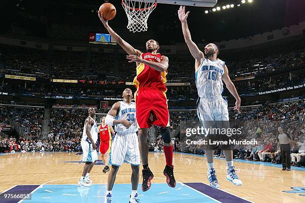 Jared Jeffries of the Houston Rockets goes to the basket against Peja Stojakovich of the New Orleans Hornets during the game on February 21, 2010 at...