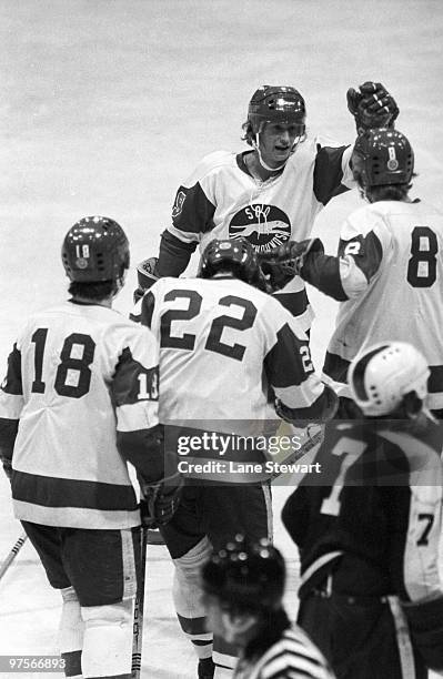 Sault Ste. Marie Greyhounds Wayne Gretzky victorious with teammates during game vs Peterborough Petes. Ontario Hockey League. Sault Ste. Marie,...
