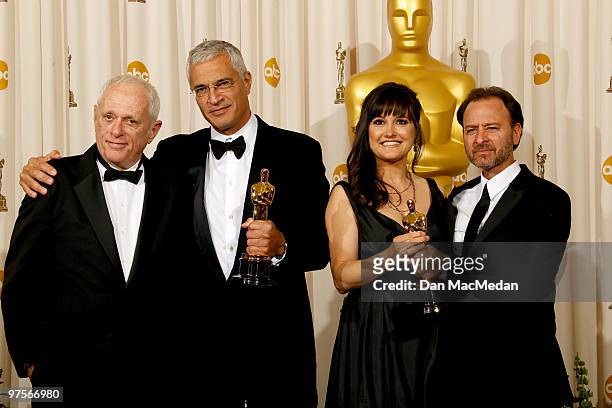Richard O'Barry, director Louie Psihoyos, producer Paula DuPre Presman and actor Fisher Stevens with their Oscars for Best Documentary Feature for...