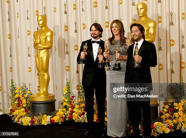 Screenwriter Mark Boal, director Kathryn Bigelow and producer Greg Shapiro, winners of the Best Picture Award for "The Hurt Locker" pose in the press...