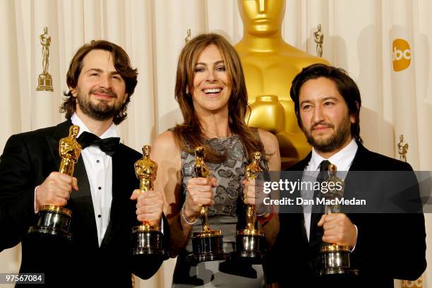 Screenwriter Mark Boal, director Kathryn Bigelow and producer Greg Shapiro, winners of the Best Picture Award for "The Hurt Locker" pose in the press...