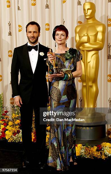 Director Tom Ford and designer Sandy Powell, winner of the Best Costume Design Award for "The Young Victoria" pose in the press room at the 82nd...