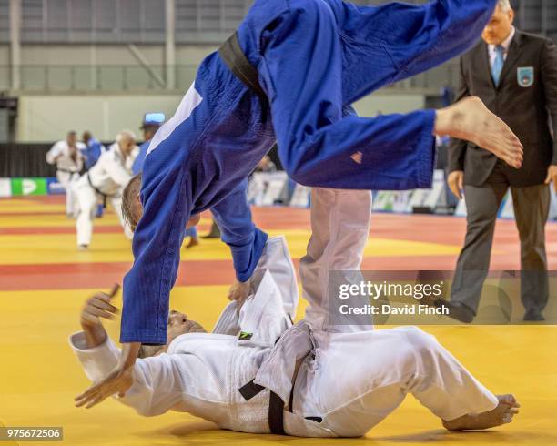 Francisco Lorenzo of Spain attacks Alexander Kirk of Great Britain with a sacrifice stomach throw but doesn't score with it after losing his...