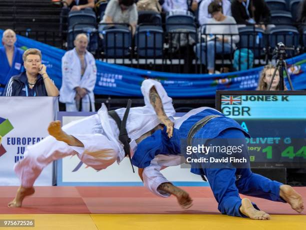 Gerard Olivet of France throws Kenneth Jones of Great Britain for a second wazari to win their first round u73kg M9_ contest by an ippon as he...