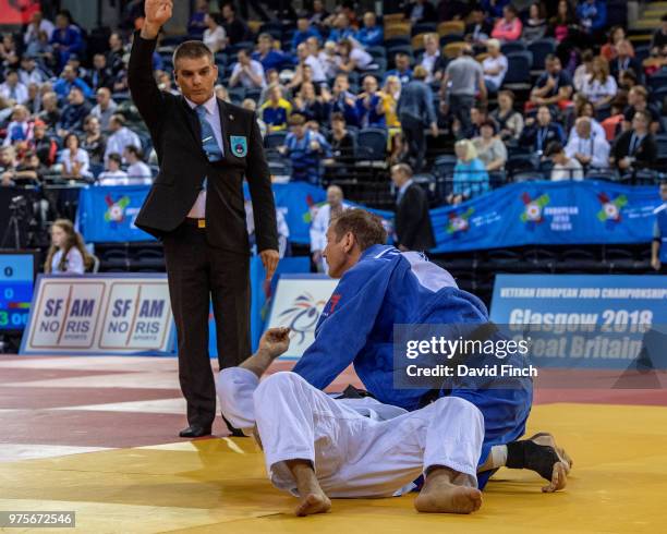 Kenneth Larsson of Sweden held Juergen Wagner of Germany for an ippon to win their u81kg M6_ contest as he progressed to the bronze medal during day...