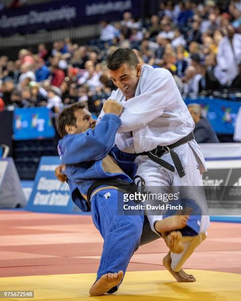 Mohamed Halabi of France counters an attack by Thierry Lagoute, also of France, to then hold Lagoute for an ippon as he progressed to the u73kg M6_...