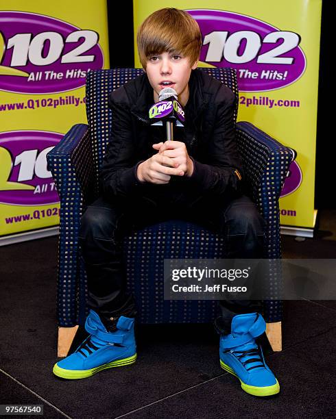 Justin Bieber poses during a meet and greet to promote his new CD ' My World 2.0' at the Q102 radio station on March 8, 2010 in Bala Cynwyd,...