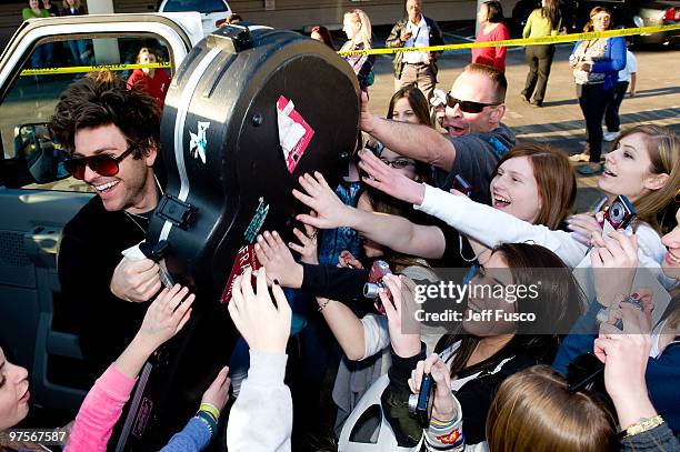 Fans gather outside the Q102 radio station prior to an appearance by singer Justin Bieber on March 8, 2010 in Bala Cynwyd, Pennsylvania.