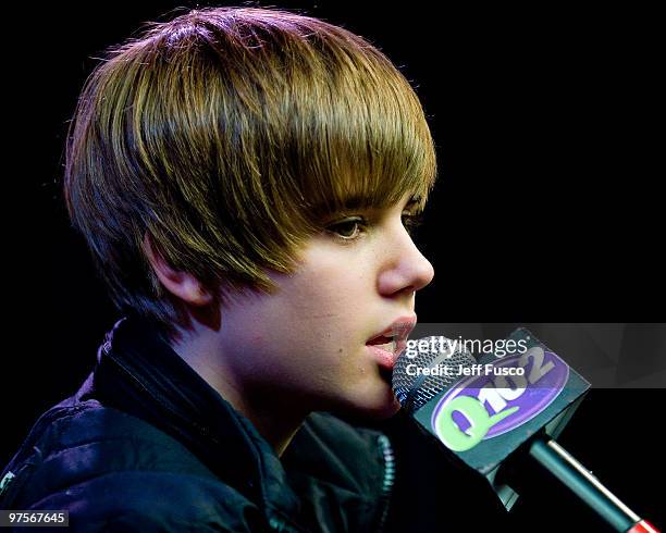 Justin Bieber speaks during a meet and greet to promote his new CD ' My World 2.0' at the Q102 radio station on March 8, 2010 in Bala Cynwyd,...