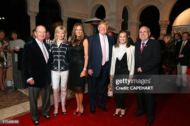 Hilary Geary Ross, Wilbur Ross, Melania Trump, Donlad Trump, Judith Giuliani, and Rudy Giuliani attend the Andrea Bocelli concert at The Mar-a-Lago...