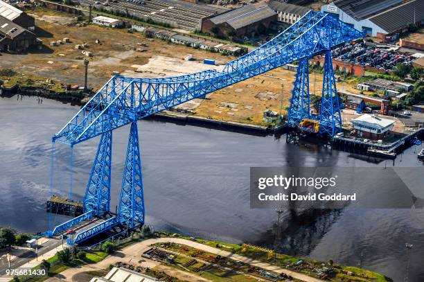 An aerial view of the Middlesbrough Transporter Bridge also called the Tees Transporter Bridge, this 100 year old bridge spans the River Tees,...