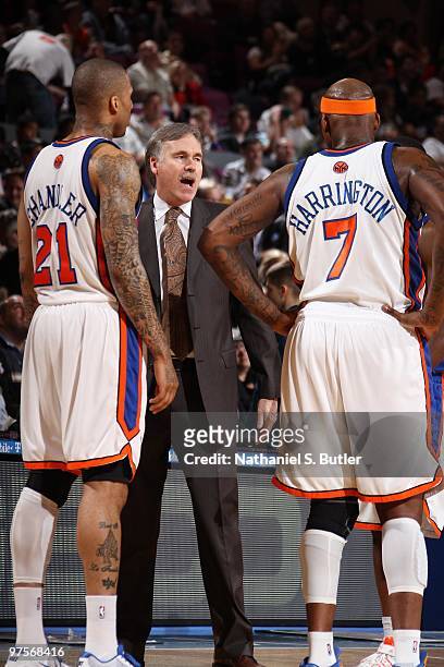 Head Coach Mike D'Antoni speaks to Wilson Chandler and Al Harrington of the New York Knicks during the game against the Atlanta Hawks on March 8,...
