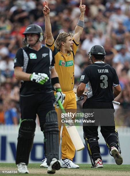 Shane Watson of Australia celebrates his wicket of Ross Taylor of New Zealand during the One Day International match between New Zealand and...