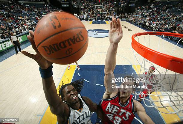 DeMarre Carroll of the Memphis Grizzlies shoots against Kris Humphries of the New Jersey Nets on March 8, 2010 at FedExForum in Memphis, Tennessee....