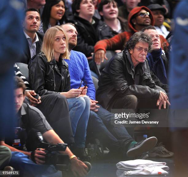 Chloe Sevigny and Lou Reed attend a game between the Atlanta Hawks and the New York Knicks at Madison Square Garden on March 8, 2010 in New York City.