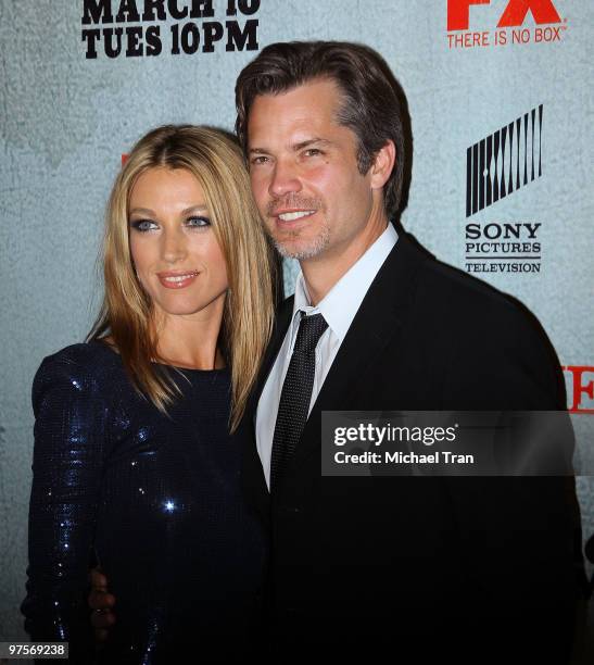 Natalie Zea and Timothy Olyphant arrive at the Los Angeles premiere screening of FX's "Justified" held at Directors Guild Theatre on March 8, 2010 in...