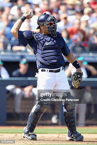 Catcher Yorvit Torrealba of the San Diego Padres in action during the MLB spring training game against the Seattle Mariners at Peoria Stadium on...