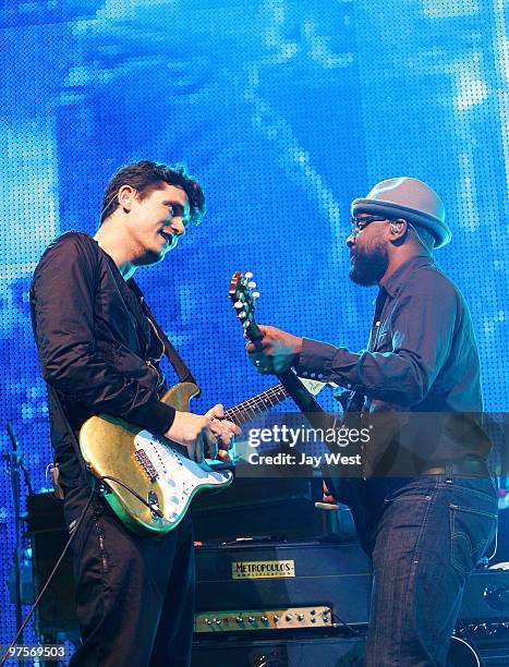 John Mayer and David Ryan Harris perform in concert at The Frank Erwin Center on March 8, 2010 in Austin, Texas.