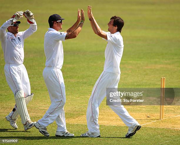 England bowler Steven Finn is congratulated by fielders Matt Prior and Kevin Pietersen during day three of the tour match between Bangladesh A and...