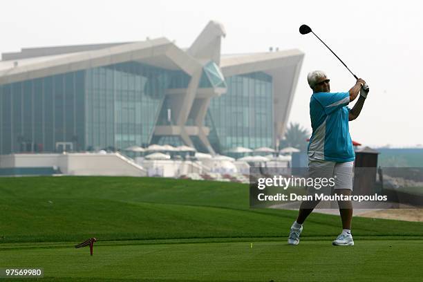 Dawn Fraser tees off on the 10th hole during the Laureus World Sports Awards Golf Challenge at the Abu Dhabi Golf Club on March 9, 2010 in Abu Dhabi,...