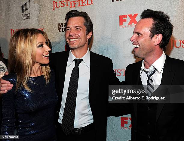 Actress Natalie Zea, actor Timothy Olyphant and actor Walton Goggins arrive at the premiere of FX Networks & Sony Pictures Television's "Justified"...