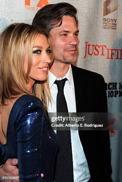 Actress Natalie Zea and actor Timothy Olyphant arrive at the premiere of FX Networks & Sony Pictures Television's "Justified" at the Director's Guild...