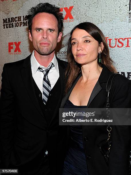 Actor Walton Goggins and guest arrive at the premiere of FX Networks & Sony Pictures Television's "Justified" at the Director's Guild Theater on...