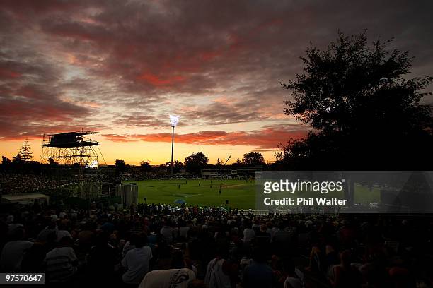 The sun sets over Seddon Park during the One Day International match between New Zealand and Australia at Seddon Park on March 9, 2010 in Hamilton,...