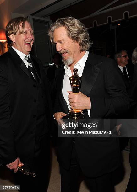 Bone Burnett and Jeff Bridges attends the 2010 Vanity Fair Oscar Party hosted by Graydon Carter at the Sunset Tower Hotel on March 7, 2010 in West...