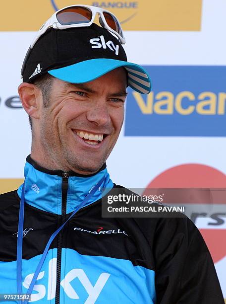 Britain's Sky cycling team's New-Zealand's Gregory Henderson celebrates on the podium on March 8, 2010 at the end of the 201,5 km second stage of the...