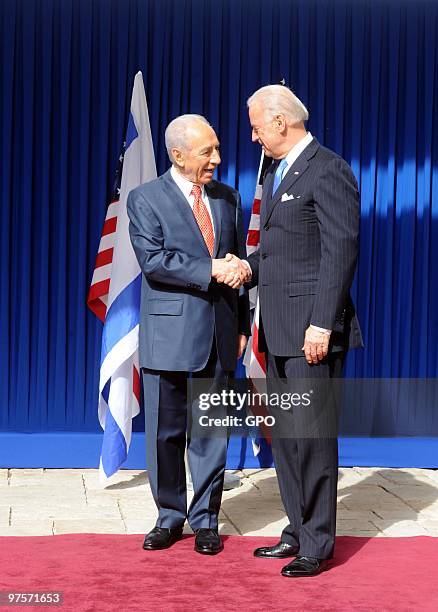 In this handout image from the Israeli Government Press Office, Israeli President Shimon Peres meets with visiting US-Vice President Joe Biden at the...