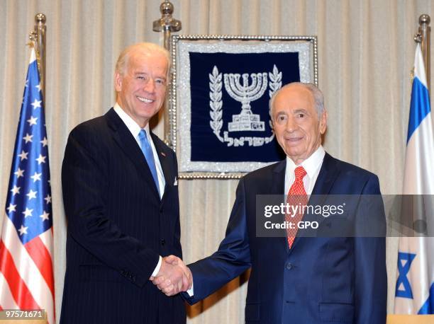 In this handout image from the Israeli Government Press Office, Israeli President Shimon Peres meets with visiting US-Vice President Joe Biden at the...