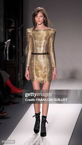 Model presents a creation by French designer Christophe Decarnin for Balmain during the autumn-winter 2010/2011 ready-to-wear collection show on...