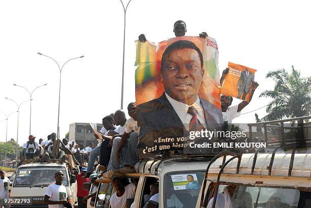 Supporters of the ruling Togolese People's Rally parade in the streets of Lome on February 16, 2010 at the start of the official election campaign....