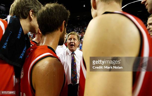 Hawks coach Gordie McLeod speaks to his players after winning game two of the NBL Grand Final Series at the Wollongong Entertainment Centre on March...