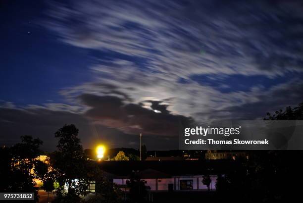 mond in den wolken - wolken stock pictures, royalty-free photos & images