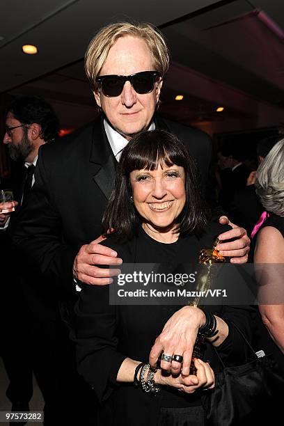 Bone Burnett and Lisa Robinson attends the 2010 Vanity Fair Oscar Party hosted by Graydon Carter at the Sunset Tower Hotel on March 7, 2010 in West...