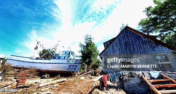 Picture taken in the tsunami-hit city of Constitucion, some 300 km south of Santiago, on March 4, 2010. The official death toll from Saturday's...