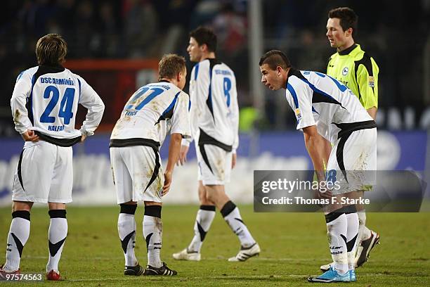 Daniel Halfar, Arne Feick, Giovanni Federico, Dominik Rotter and Dennis Eilhoff of Bielefeld stand dejected on the pitch after the Second Bundesliga...