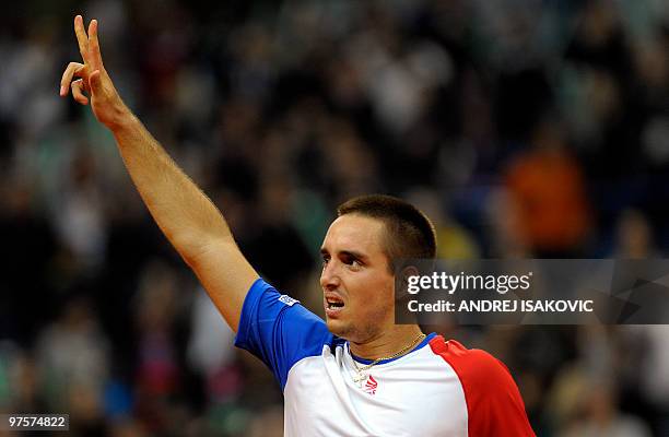 Serbia's Viktor Troicki reacts after winning against US John Isner during their Davis Cup World Group first round tennis match on March 5 in Belgrade...