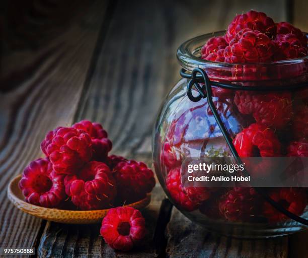 fresh pickled organic raspberries - hobel stockfoto's en -beelden