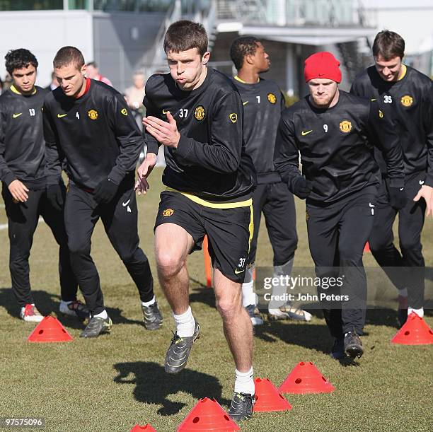 Michael Carrick of Manchester United in action during a First Team Training Session at Carrington Training Ground on March 9 2010 in Manchester,...