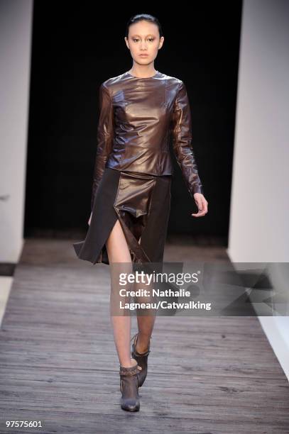 Model walks the runway during the Guy Laroche Ready to Wear show as part of the Paris Womenswear Fashion Week Fall/Winter 2011 at Le Carrousel du...